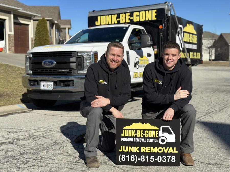 junk be gone crew in front of truck